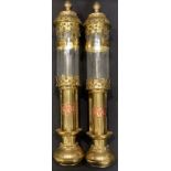 A pair of brass railway carriage lamps, copper GWR plaques, 36cm long
