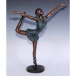 In the manner of Demétre Chiparus, a bronze figure, dancing girl, 54cm high