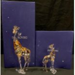 A Swarovski Crystal model, Giraffe Mudiwa, Annual Edition 2018, boxed, certificate; another, Giraffe