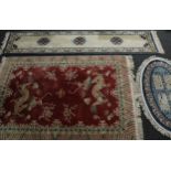 A Chinese rectangular rug or carpet, 276cm x 182cm; others, runner, 368cm x 77cm; oval, 156cm x 95cm