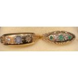 An Edwardian 18ct gold ring, set with a central blue stone flanked by a pair of diamond chips,