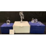 A Swarovski Crystal SCS bird model, Red-Crowned Cranes, boxed; others, Swans, Jubilee Edition