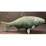 A large contemporary bronze sculpture of a carp, 96cm long