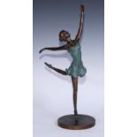 In the manner of Demétre Chiparus, a bronze figure, dancing girl, 47cm high