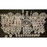 Glassware - a set of twelve Royal Doulton cut glass wine glasses; another set of eight similar