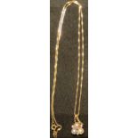 A 9ct gold necklace and pendant, the pendant set with three cultured pearls, 3.3g, boxed