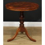 A 19th century vernacular tripod centre table, possibly Welsh, circular yew top, turned column,