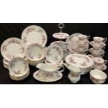 A Royal Albert Lavender Rose pattern dinner and tea service, comprising cake plate, three tier