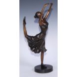 In the manner of Demétre Chiparus, a bronze figure, dancing girl, 44.5cm high