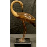 A Carolyn Kinder Art Deco style model of a Golden Eagret, 50.5cm high