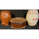 A 19th century salt glazed stoneware spittoon; a 19th century salt glazed stoneware barrel,
