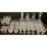 A set of six cut glass whisky tumblers, four wine glasses, six sherry glasses, assorted liqueur