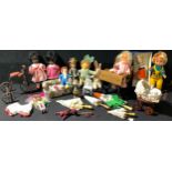 A collection of dolls and accessories, comprising a Hamilton Heritage doll, boxed; a Pedigree