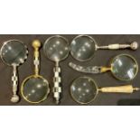 A collection of six magnifying glasses, various decorative handles, the longest 27cm