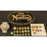 Automobilia - a Manx Norton advertising cast iron plaque; a collection of twenty six motorcycle