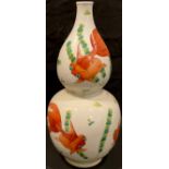 A Chinese double gourd vase, painted in polychrome with goldfish, 29cm high, blue double circle mark