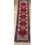 A hand made Ardebil carpet runner, 283cm x 76cm