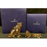 A Swarovski Crystal SCS model, Amur Leopard Sofia, boxed; a pair of Amur Leopard Cubs, boxed (3)