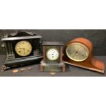 An American mantel clock; a mahogany Napoleon hat mantel clock; a French black slate and rouge