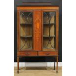 An Edwardian mahogany and marquetry display cabinet, rectangular top with shaped pediment above a