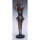 In the manner of Demétre Chiparus, a bronze figure, dancing girl, 48.5cm high