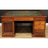 A 19th century mahogany partners desk, rectangular top with inset writing surface above three frieze