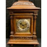 A late 19th century oak bracket clock of architectural form with Wurttemberg movement