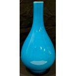 A Chinese monochrome ovoid bottle vase, glazed in tones of mottled turquoise, 28cm high