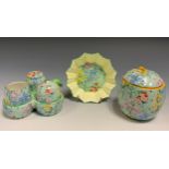 A Shelley Melody Chintz three piece cruet set on stand, preserve jam, cover and dish