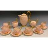 A Carlton Ware coffee service, for six, in pink with gilt scroll, gilt handles, comprising coffee