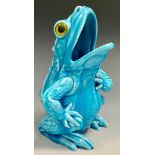 A continental majolica frog/toad, in turquoise, glass eyes, 12cm high, impressed marks, 1228