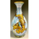 A Wedgwood Dragon lustre ovoid vase, designed by Daisy Makeig-Jones, printed in gilt with