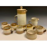 Studio Pottery - a stoneware tea/coffee service for six, comprising teapot, milk jug, sugar bowl,