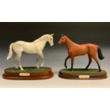 A Royal Doulton model, Red Rum, no. DA18, 32cm high, boxed; others, Dessert Orchid, DA184 (2)