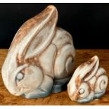 A Langley Mill Oakes period stoneware stylised rabbit, in tones of blue and tan, 15cm high;