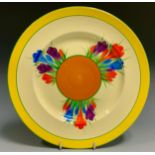 A Clarice Cliff Crocus pattern 25.5cm diameter plate, yellow rim, Wilkinsons marks