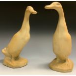 A pair of Denby novelty models, of geese, 22cm high, inglazed (2)