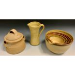 Studio Pottery - a nested set of six stoneware mixing bowls, the largest measuring 23.5cm