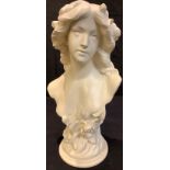 An Art Nouveau style plaster bust, of a young lady, 47cm high