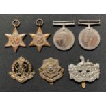 WW2 British 1939-45 Star, Italy Star, War Medal and Defence Medal, all without ribbons together with