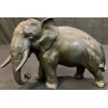 A Japanese cold painted spelter model of an elephant, early 20th century, 14.5cm high