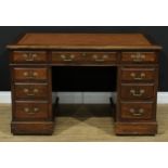 An early 20th century oak and veneer twin pedestal desk, rectangular top with inset writing