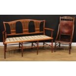 An Edwardian triple-chair-back sofa, 90cm high, 137.5cm wide, the seat 116cm wide and 42cm deep;