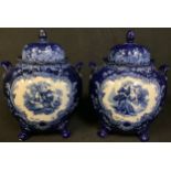 A pair of Losol Ware Watteau blue and white pattern two handled covered vases, 28cm high, c.1925
