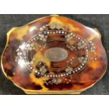 A Victorian tortoiseshell purse, gold and mother of pearl inlaid, 7cm long