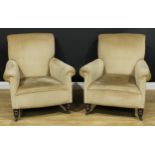 A pair of late Victorian/Edwardian armchairs, in the manner of Howard & Sons, 89cm high, 83cm