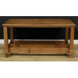 An Arts & Crafts oak table, rectangular top with moulded edge, square legs, triple-stretcher,