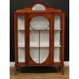 An early 20th century mahogany display cabinet, arched half gallery centred by a bevelled demilune
