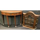 A 20th century mahogany wall handing display cabinet, arched cornice, glazed door, 70cm high, 66cm
