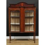 An Edwardian mahogany and marquetry display cabinet, arched three-quarter gallery inlaid with
